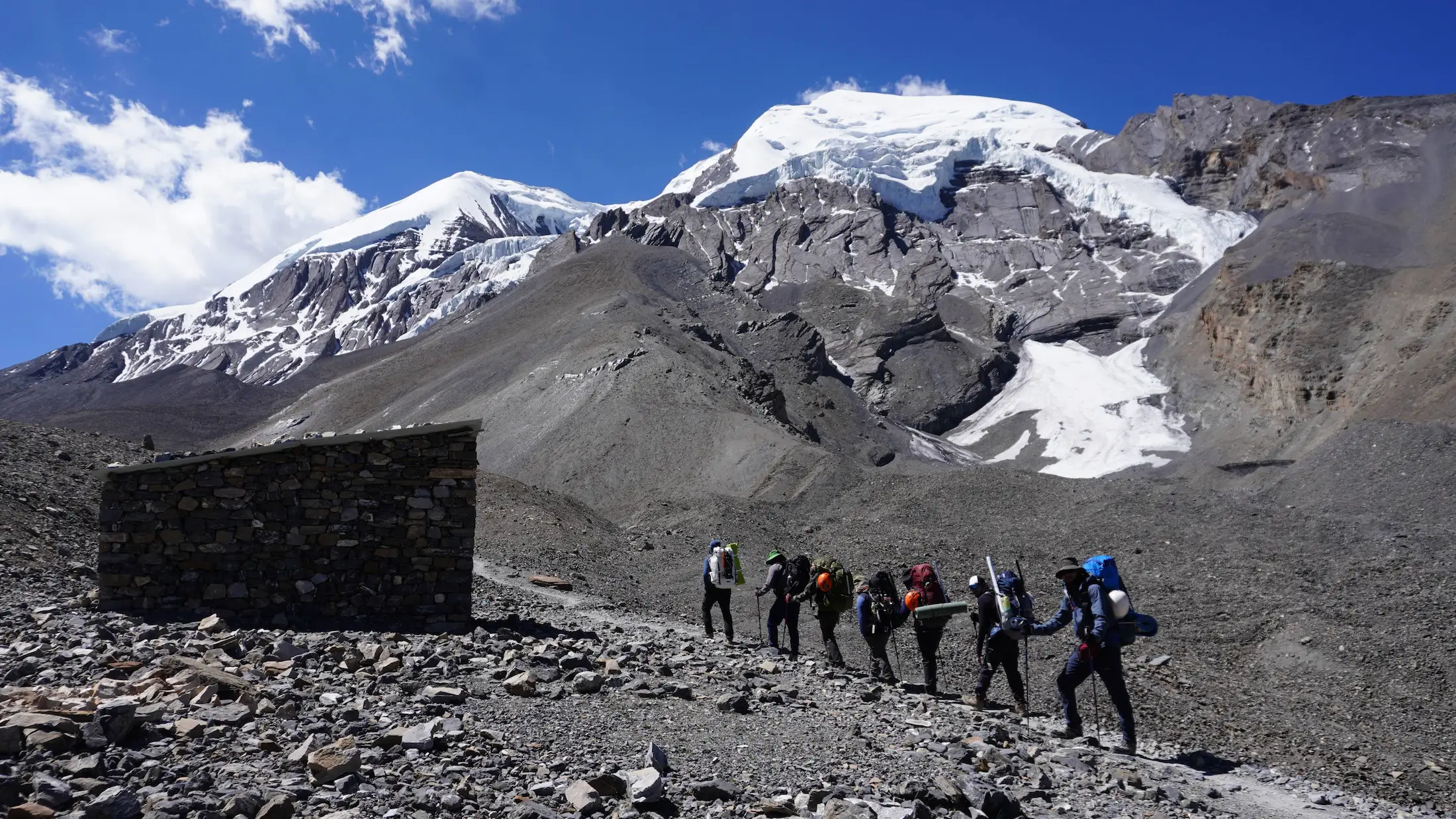 Climbers ascending Thorong Peak in the Annapurna region of Nepal during a high altitude climb