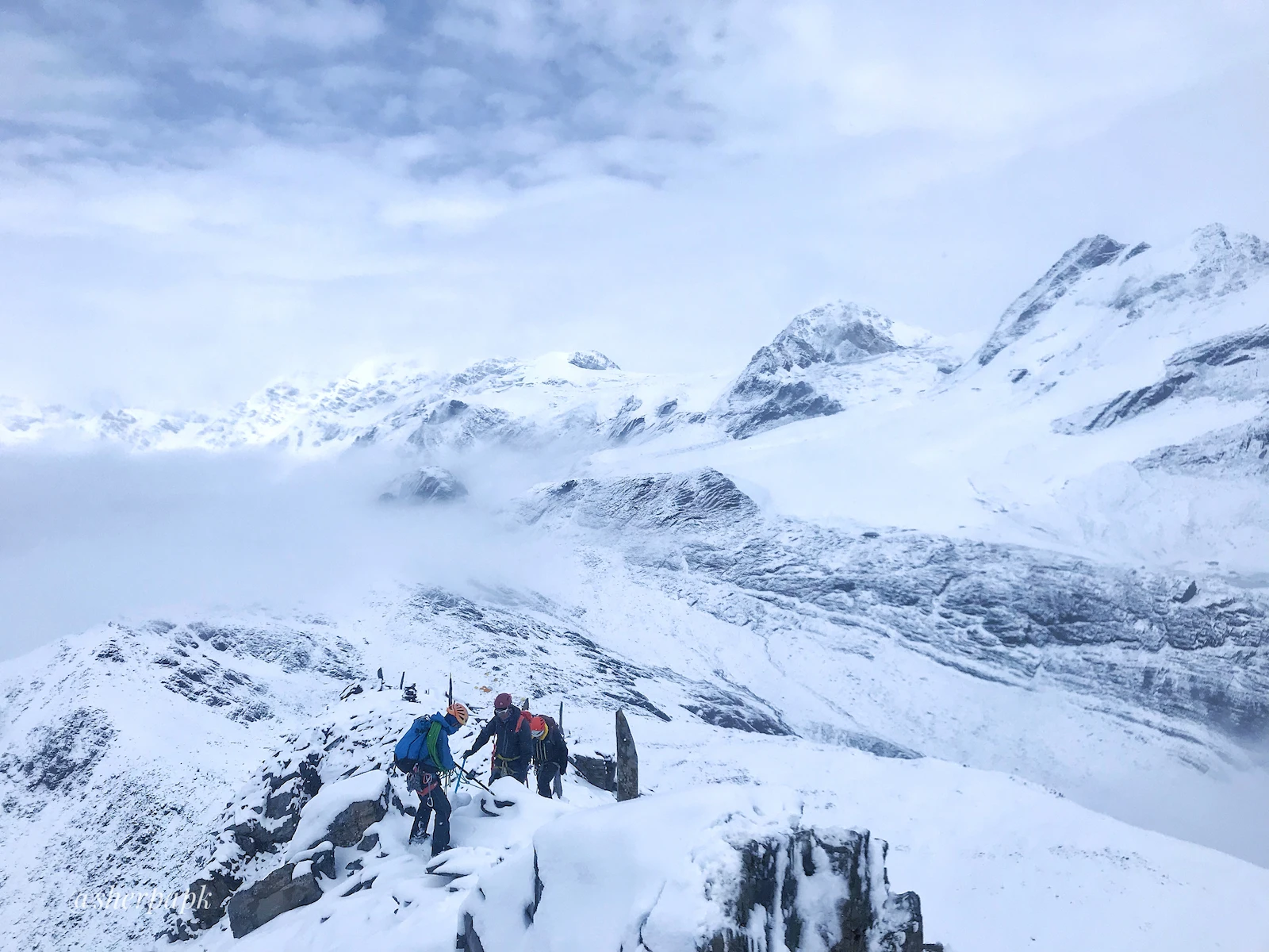 Mountaineering training at Kang La Pass in Nepal with climbers practicing high altitude skills