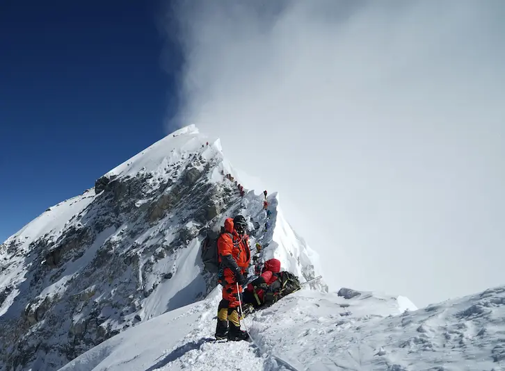 High-altitude mountaineering expedition in the Nepal Himalayas with climber on Mt. Everest