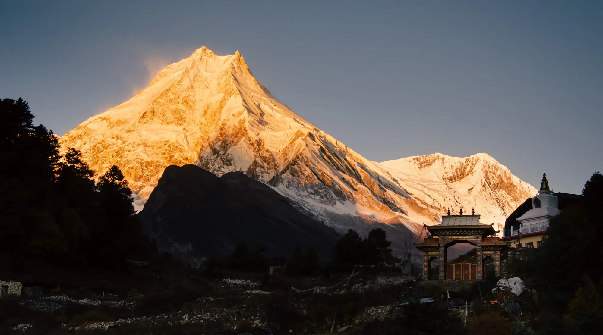 Manaslu peak towering over remote mountain valleys in Nepal